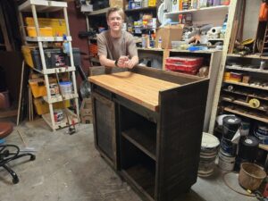 Tony Locke with Caleb building custom Coffee Cabinet
