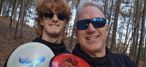 Tony Locke with Eli Locke Frisbee golf