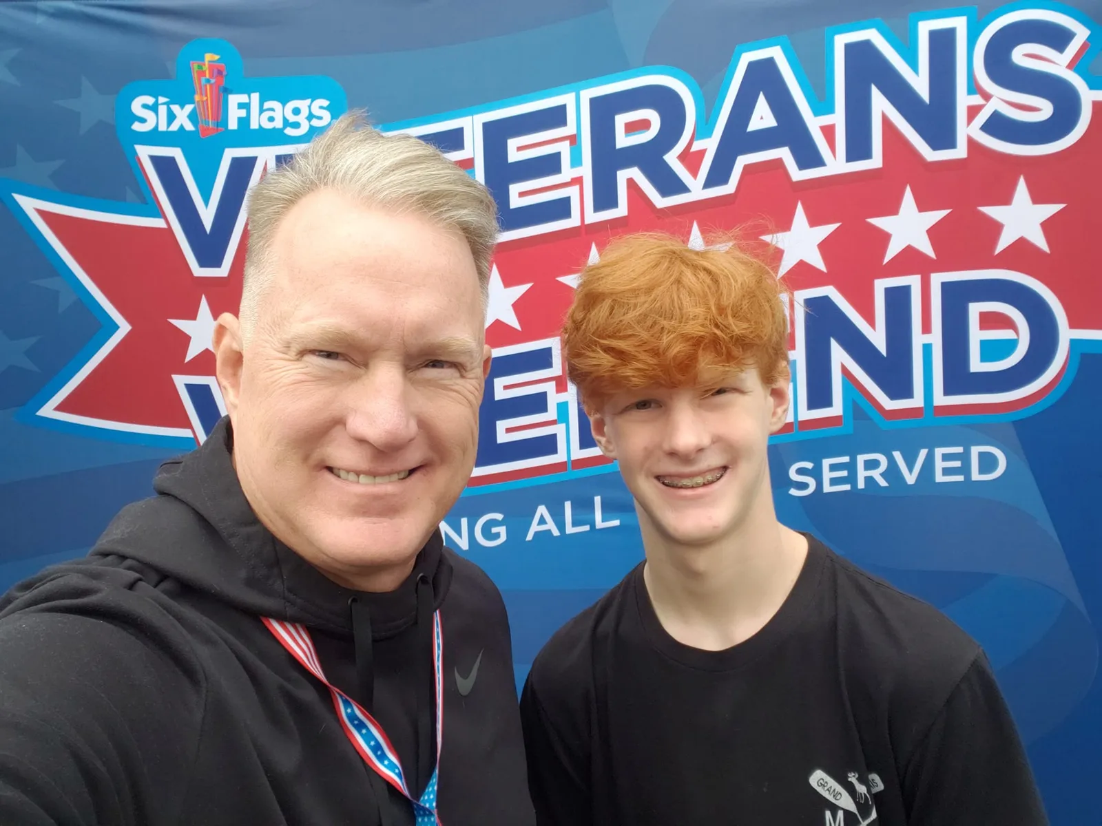 Tony Locke and his son at a Veterans Weekend event