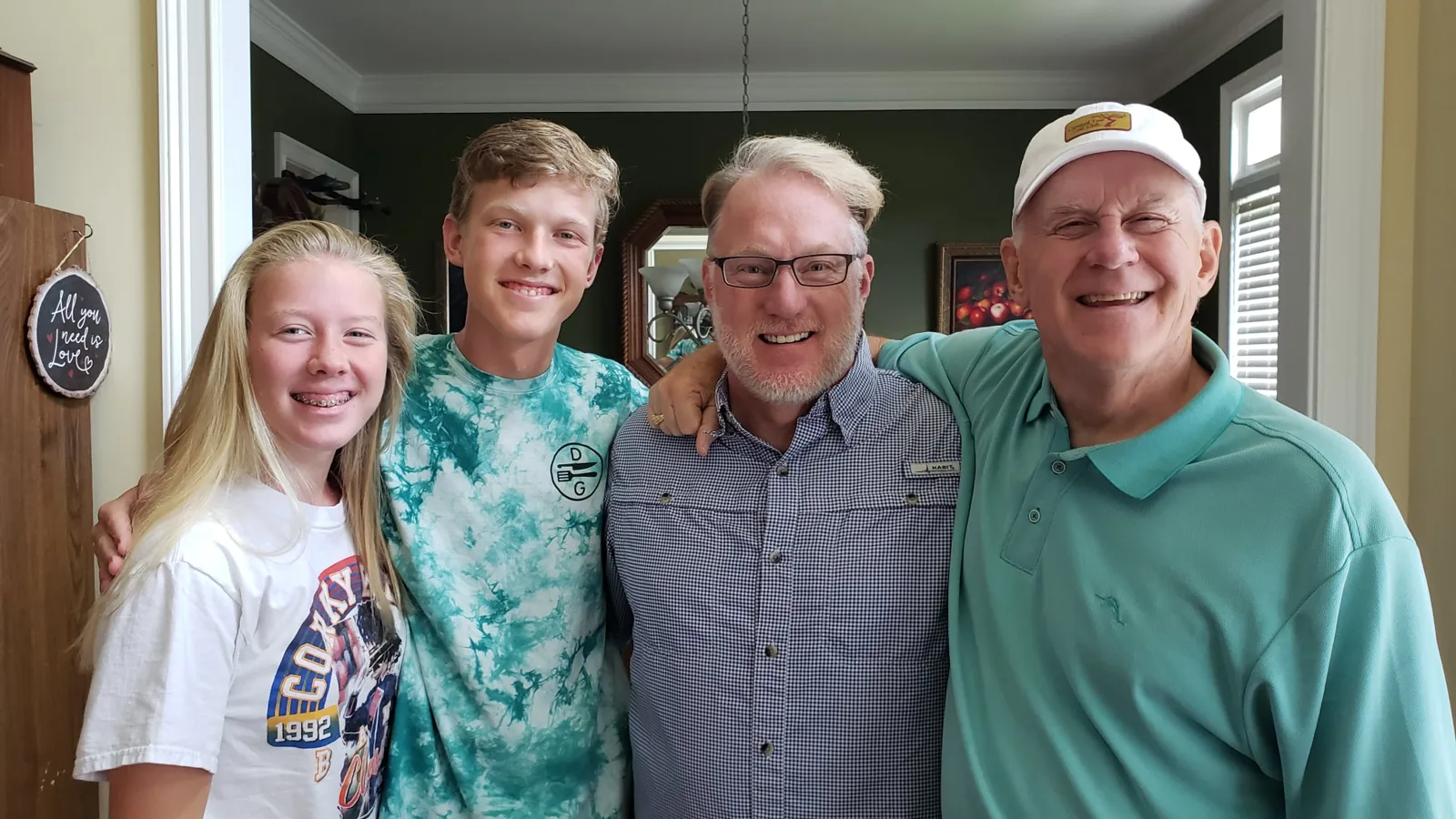 Tony Locke with his children and his father